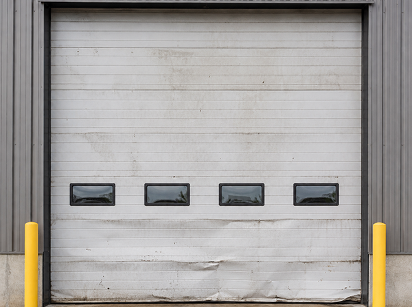 Commercial Garage Door Before Repair