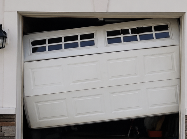 Garage Door before Repairing